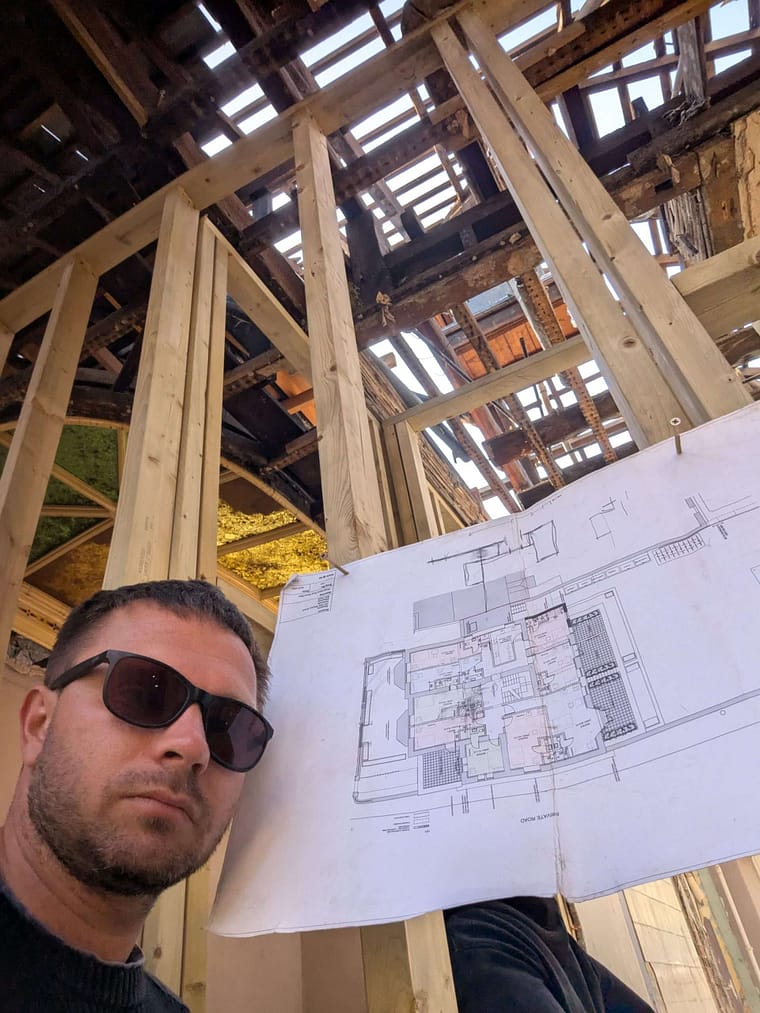 martin-howard-hmo-conversion-floor-plans Martin Howard reviewing architectural floor plans during a Vernon Property Group HMO conversion.